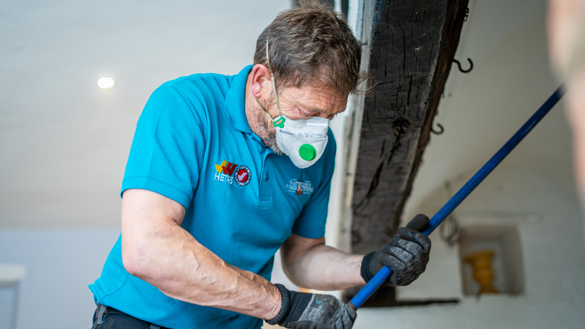 Watmore's Woodburners engineer carrying out chimney lining work in a Norfolk property